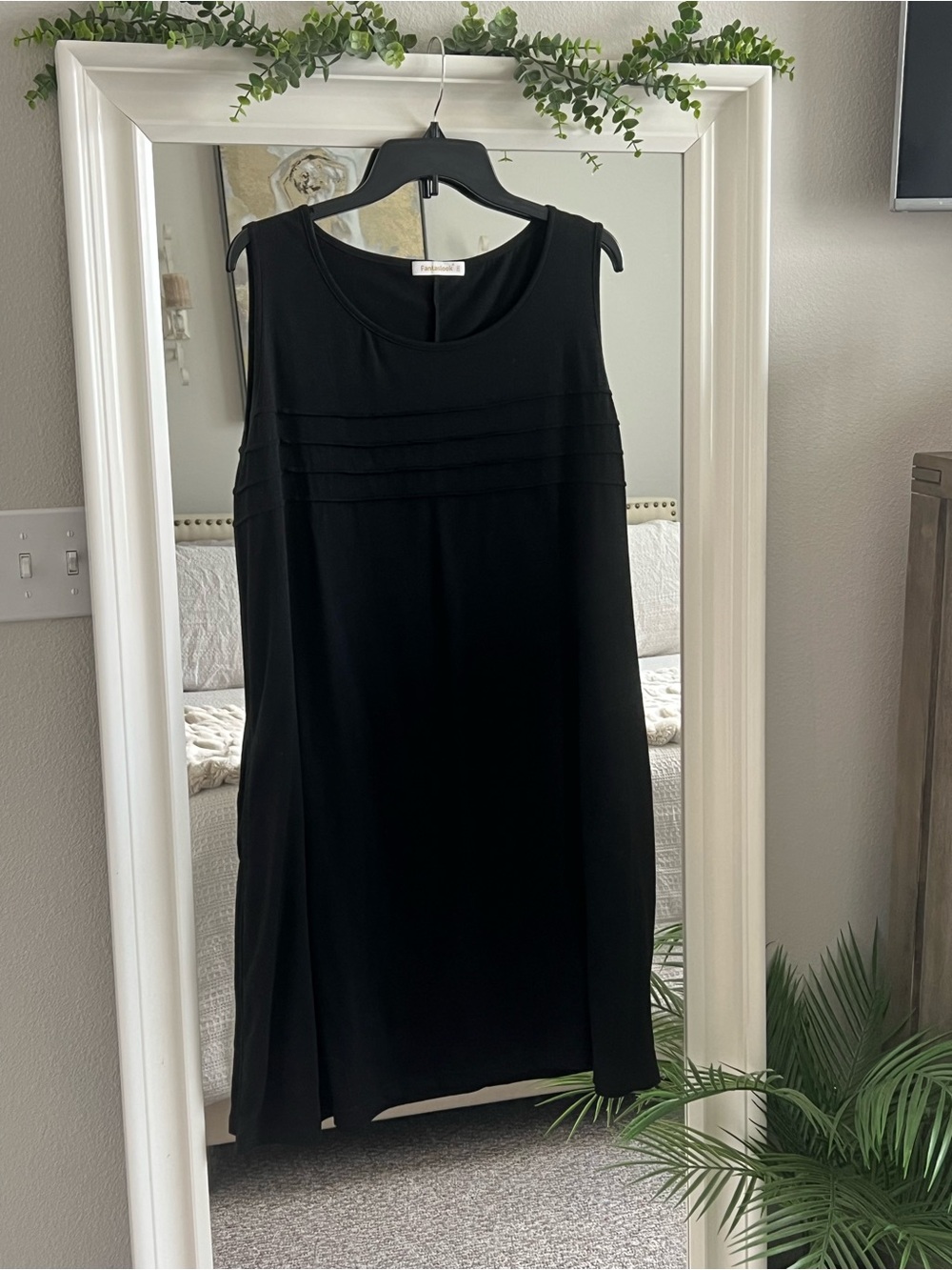 Elegant Black Sleeveless Midi Dress with Pleat Detail